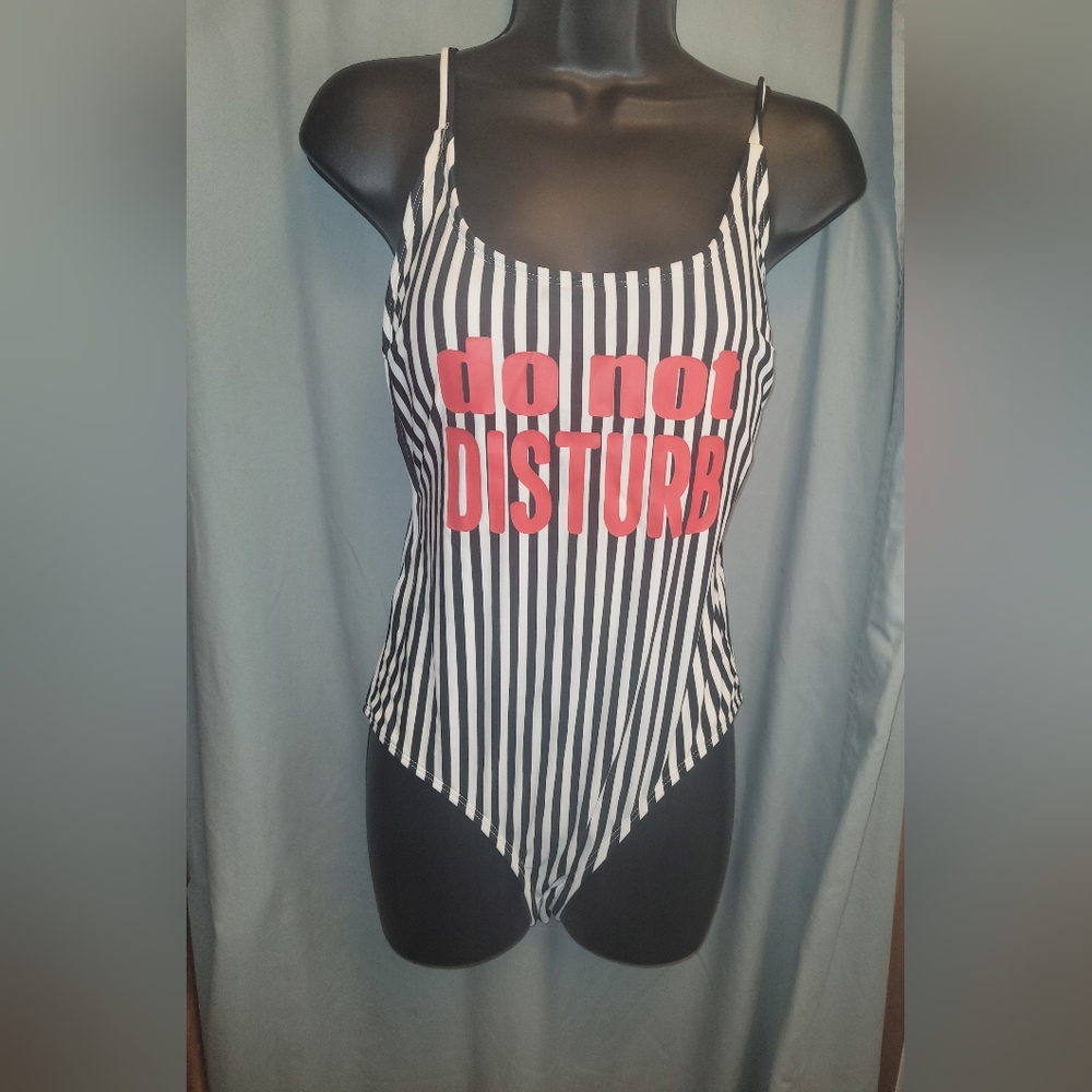 Black & white striped one-piece swimsuit. Size M.
